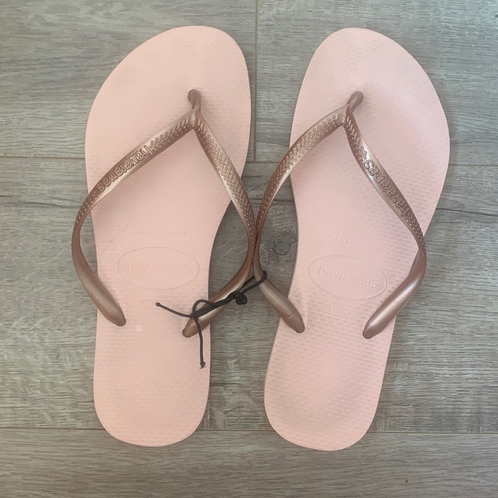 Worn twice haviana rose gold strap and pink sandals.
